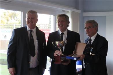 Captain Mike Harvey receives the league Cup - Triumphant B team win league play-off